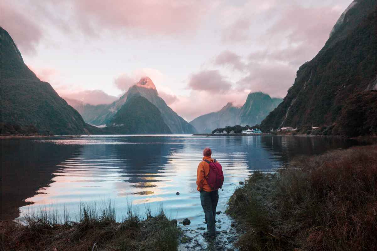 Redhead tourist visiting Milford Sounds