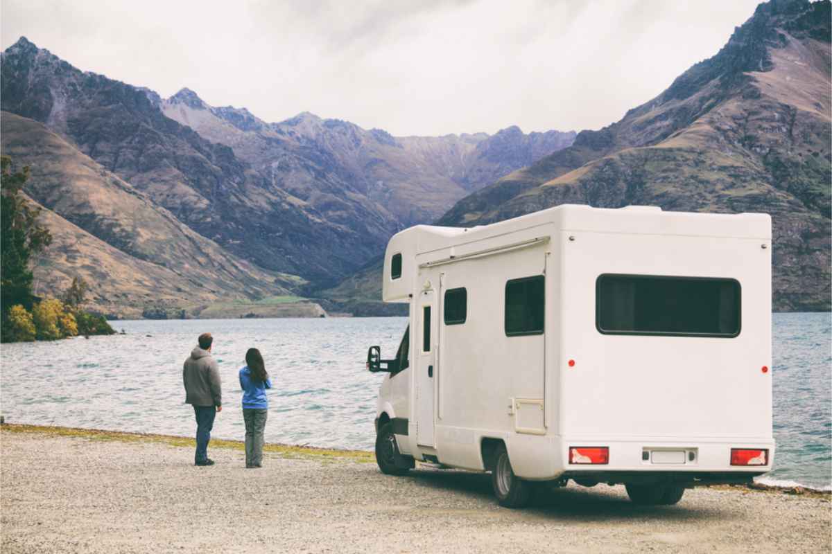 Couple enjoying NZ landscapes with their RV motorhome