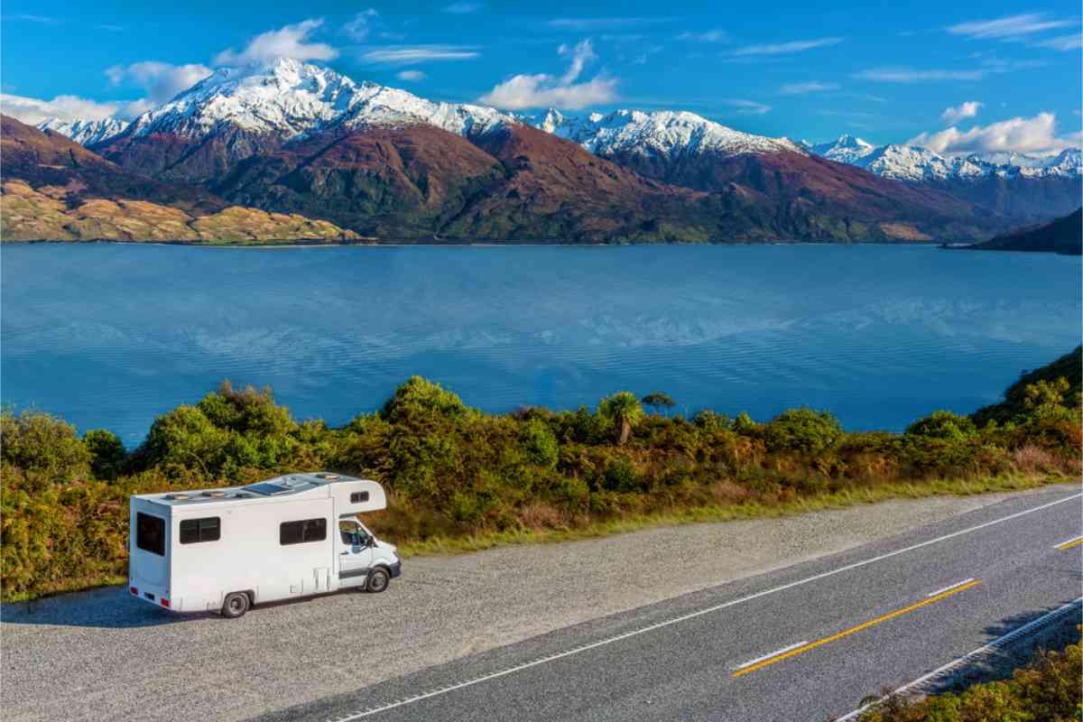 RV parked by the road with an impressive view of Nz mountains