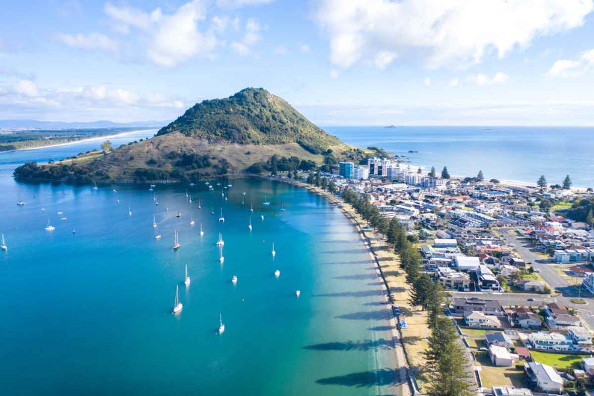 Aerial views of Mount Managui on a sunny day with a intense blue sea waters