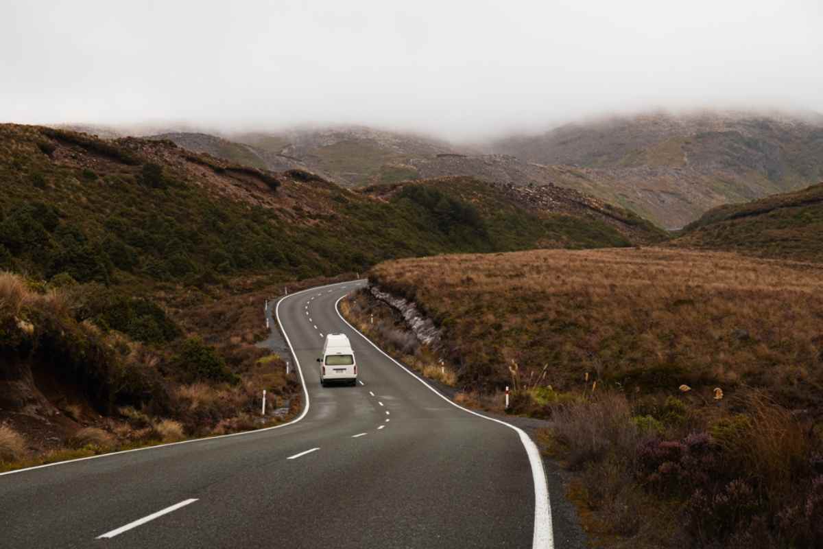 Camper on the road in New Zealand on a cloudy day